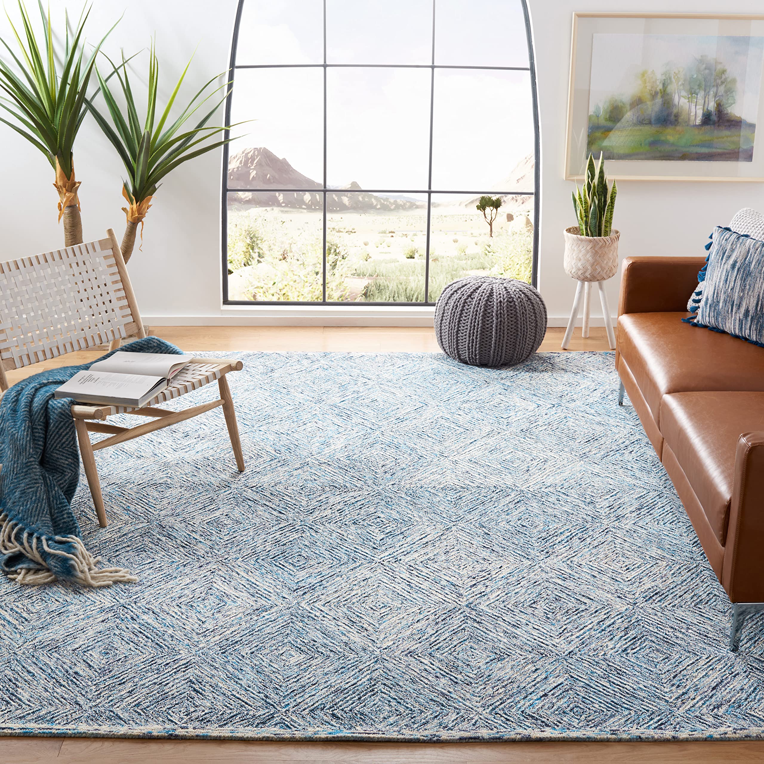 SAFAVIEH Capri Collection Area Rug - 9' x 12', Ivory & Blue, Handmade Wool, Ideal for High Traffic Areas in Living Room, Bedroom (CPR207A)