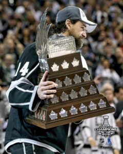 justin williams los angeles kings unsigned 2014 stanley cup champions raising conn smythe photograph - original nhl art and prints