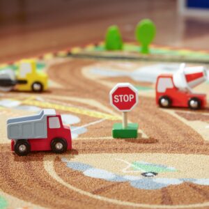 Melissa & Doug Round the Construction Zone Work Site Activity Play Rug With 3 Wooden Trucks (39" x 36")