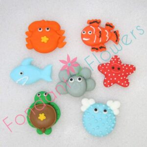 set of 21 royal icing edible sea creatures - cupcake toppers by sugar deco