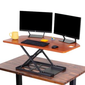stand steady x-elite pro corner standing desk | 40 inch corner sit to stand desk converter ideal for cubicles and l shaped desks! easy height-adjustable and fully assembled! (cherry)