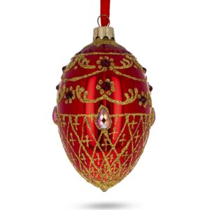 ruby jewels on glossy red glass egg ornament 4 inches