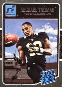 michael thomas 2016 donruss mint rated rookie card #386 picturing this new orleans saints star in his black jersey