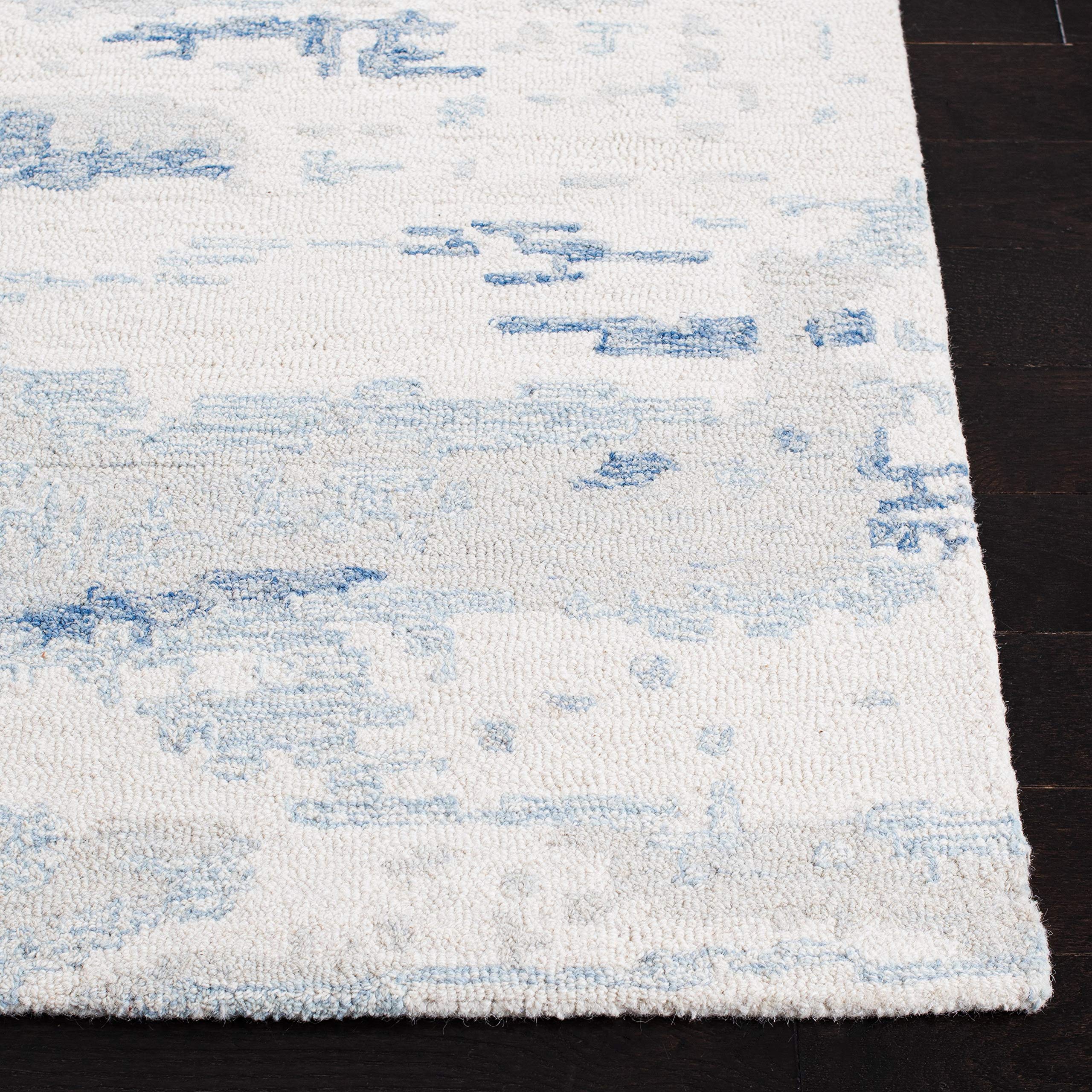 SAFAVIEH Abstract Collection Area Rug - 8' x 10', Ivory & Blue, Handmade Abstract Wool, Ideal for High Traffic Areas in Living Room, Bedroom (ABT465A)