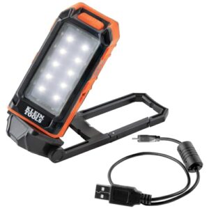 klein tools 56403 led light, rechargeable flashlight / worklight with kickstand and carabiner, charges small electronics, for work, camping