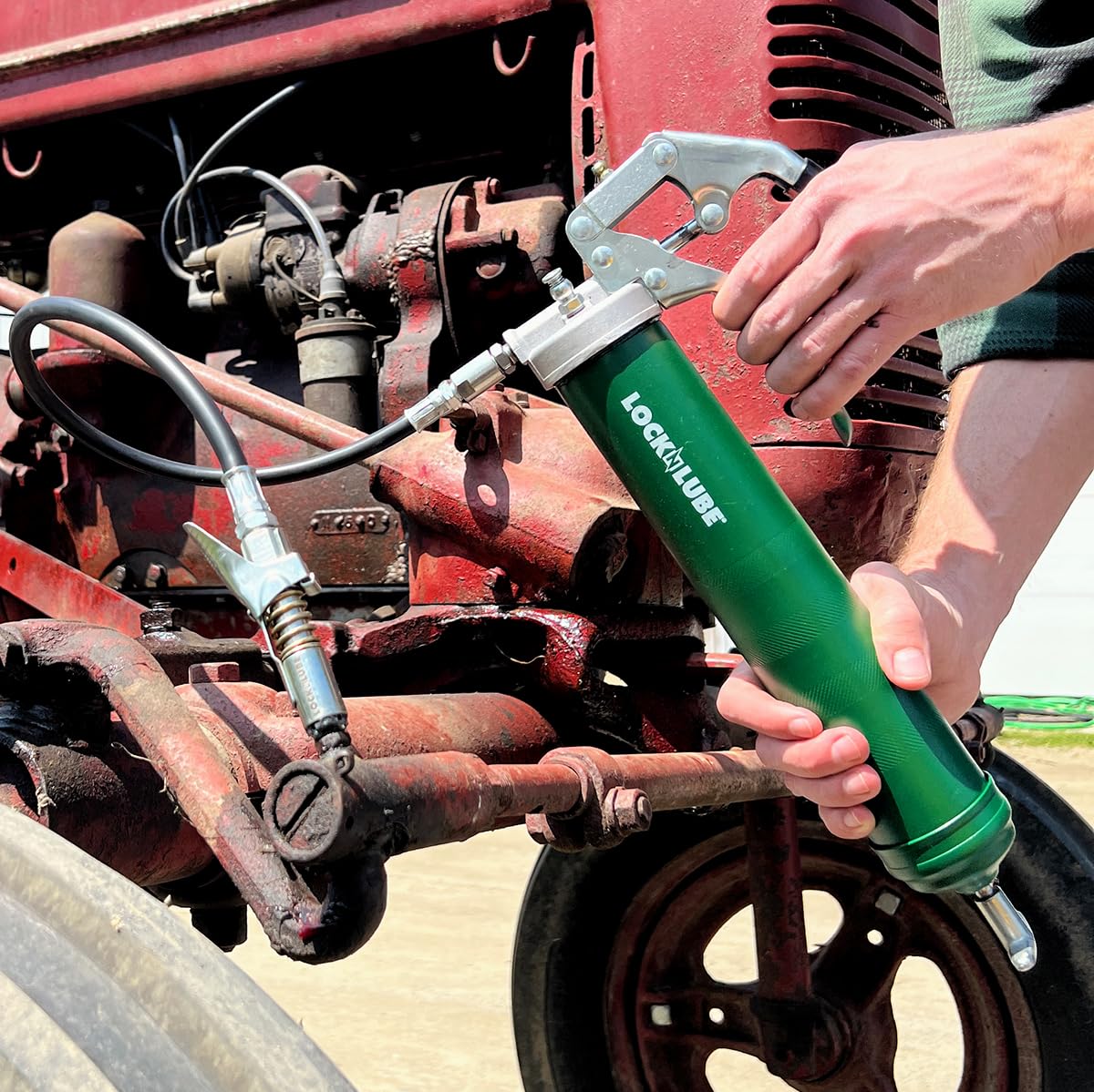 LockNLube Heavy-Duty Pistol Grip Grease Gun. Includes our patented LockNLube® Grease Coupler (Locks On, Stays On, Won't Leak!) plus a high-quality 20" hose and in-line hose swivel