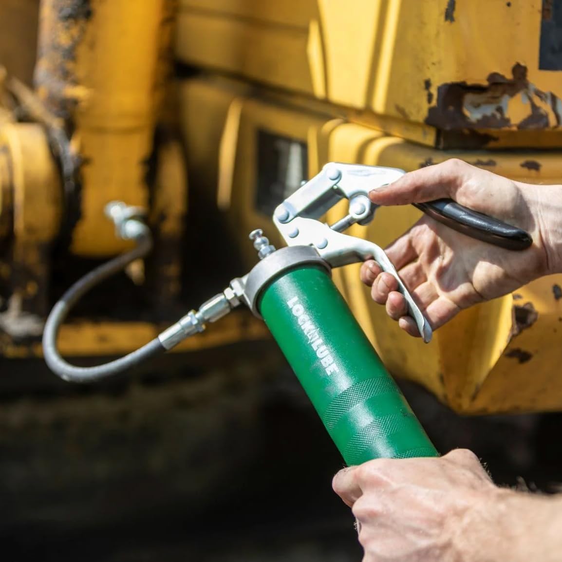 LockNLube Heavy-Duty Pistol Grip Grease Gun. Includes our patented LockNLube® Grease Coupler (Locks On, Stays On, Won't Leak!) plus a high-quality 20" hose and in-line hose swivel