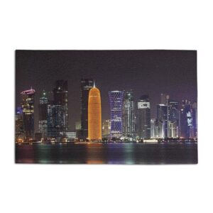 ambesonne urban doormat, qatar middle east town with luminous skyscraper at night view, decorative polyester floor mat with non-skid backing, 30" x 18", charcoal grey purple orange