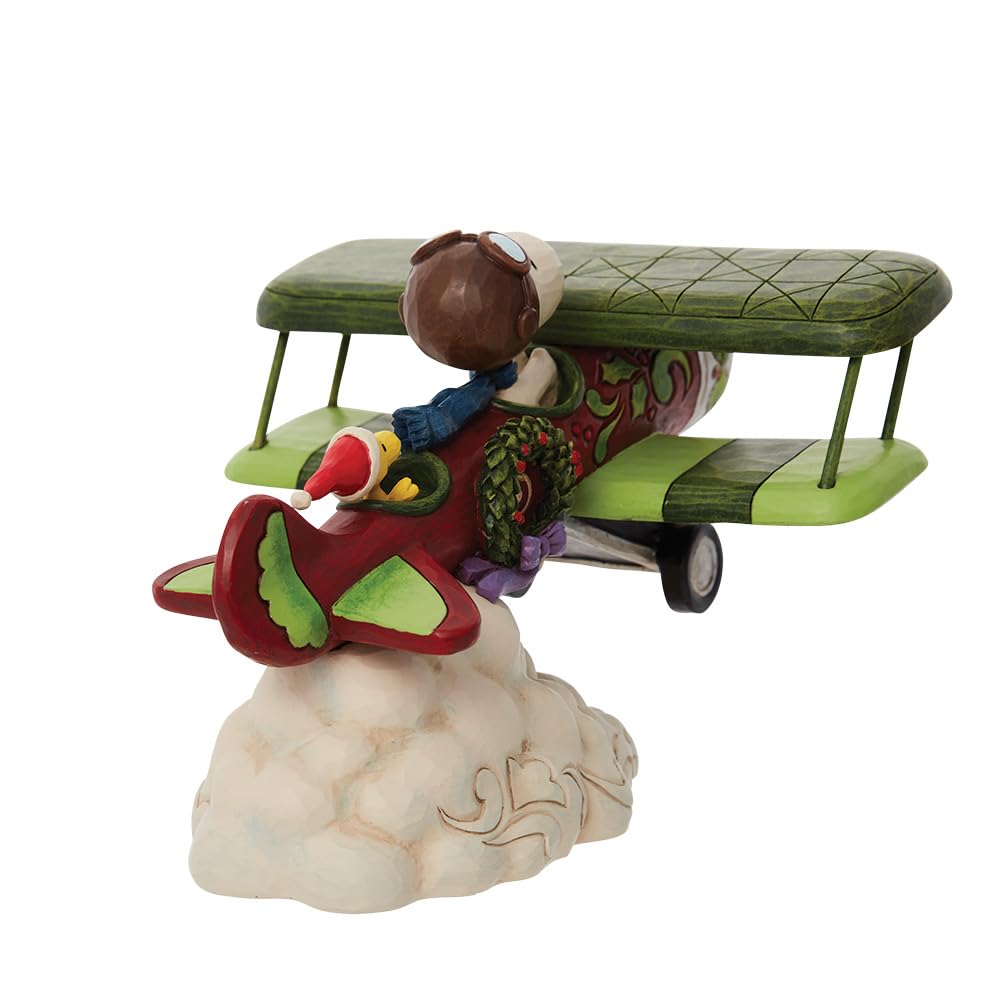 Enesco Peanuts by Jim Shore Snoopy Flying Christmas Ace Plane Figurine, 5.12 Inch, Multicolor