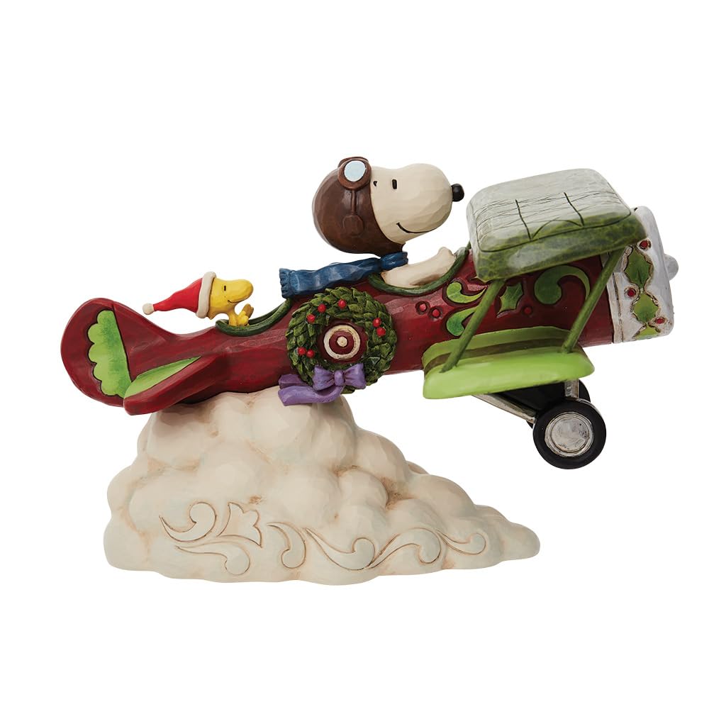 Enesco Peanuts by Jim Shore Snoopy Flying Christmas Ace Plane Figurine, 5.12 Inch, Multicolor