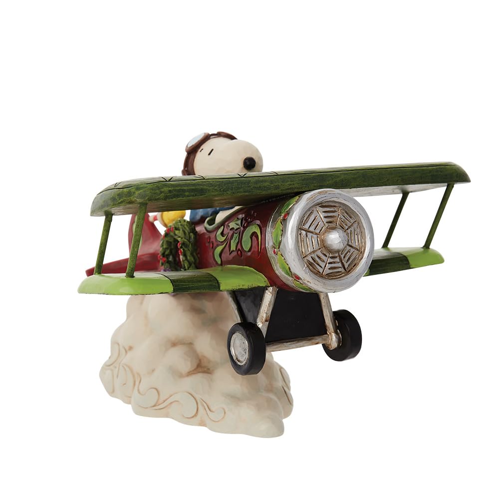 Enesco Peanuts by Jim Shore Snoopy Flying Christmas Ace Plane Figurine, 5.12 Inch, Multicolor