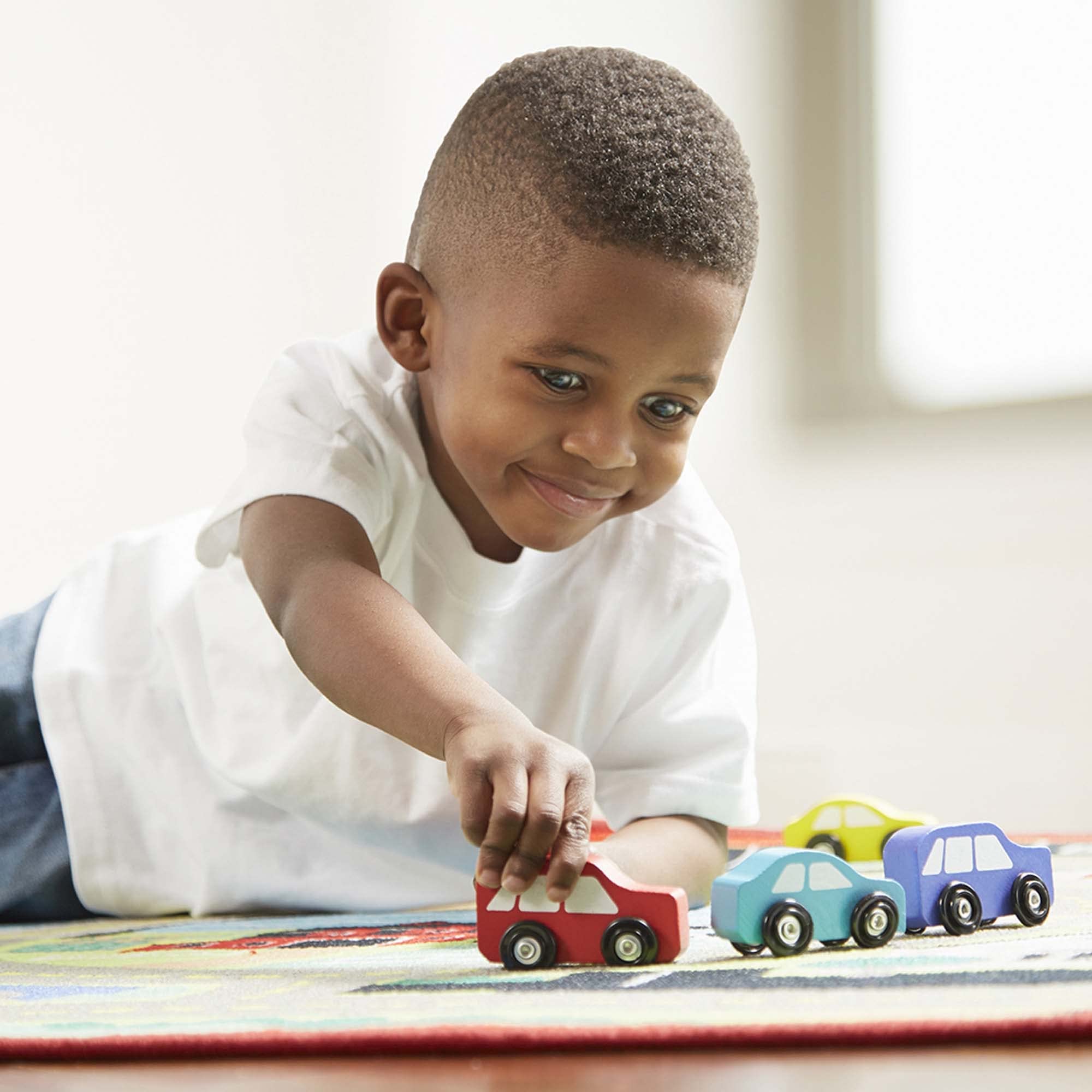 Melissa & Doug Round the Town Road Rug and Car Activity Play Set With 4 Wooden Cars (39 x 36 inches)