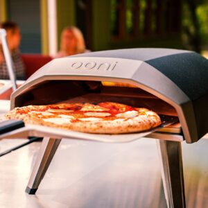 Ooni Koda 12 Portable Gas Pizza Oven with Ooni 12" Perforated Peel + Protective Cover- Outdoor Pizza Oven for Authentic Stone