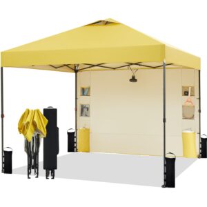 tunbne 10'x10' pop up canopy tent with sidewall and 6 pockets, patented one push, 1 person easy up, instant shade canopy with vented roof for patio outdoor, case, 8 stakes, 4 ropes, 4 sandbags(yellow)