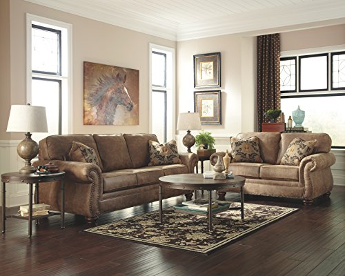 Signature Design by Ashley Larkinhurst Faux Leather Sofa with Nailhead Trim and 2 Accent Pillows, Brown