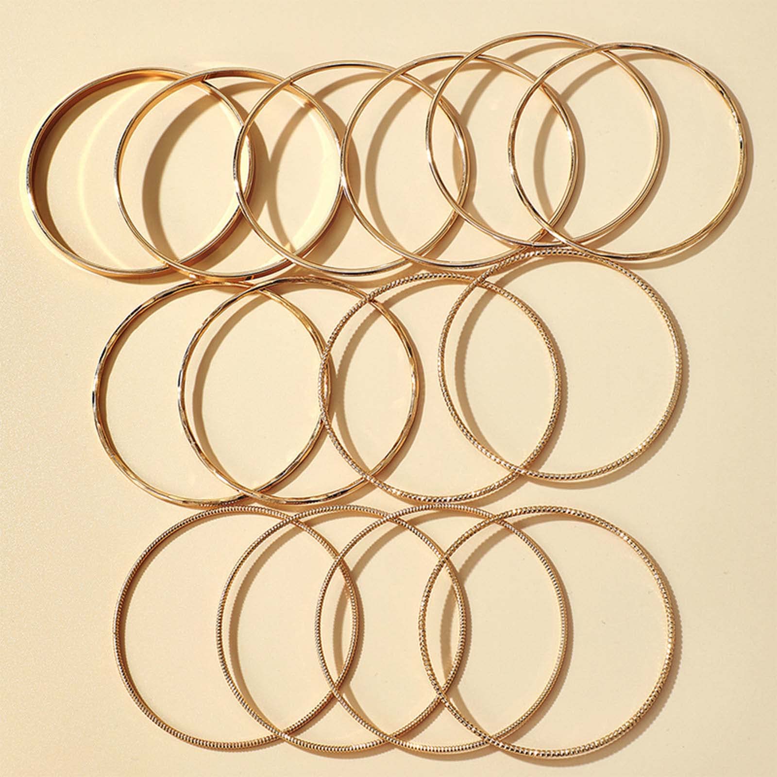 Sttiafay 14Pcs Gold Bangle Bracelet Set Indian Stackable Glossy Bracelets Multipack Wrap Bangles Costume Jewelry for Women