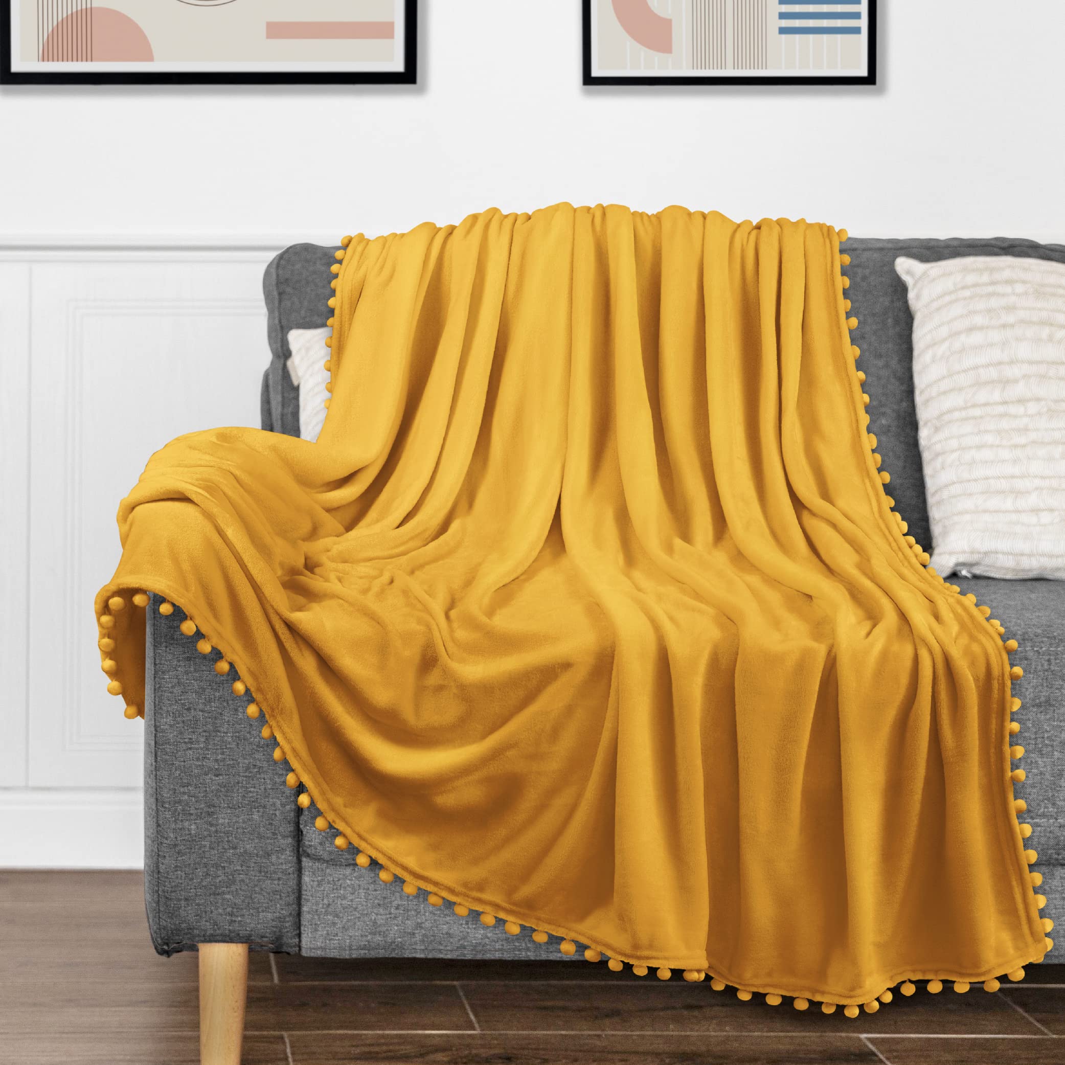 PAVILIA Mustard Yellow Throw Blanket Pom Pom for Couch, Twin Size, Soft Fleece Cozy Pompom Fringe Sofa Blanket, Decorative Home Gift Flannel Velvet, Gold Yellow, 50x60