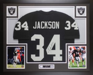 bo jackson autographed black jersey - beautifully matted and framed - hand signed by bo jackson and certified authentic by beckett - includes certificate of authenticity