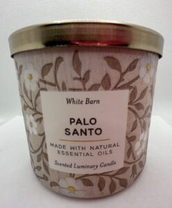 palo santo 3 wick 14.5 ounce scented candle tan label with brown leaves and white flowers