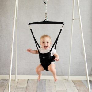 Jolly Jumper **CLASSIC** - Black Saddle- The Original Jolly Jumper with stand. Trusted by parents to provide fun for babies and to create cherished memories for families for over 75 years.