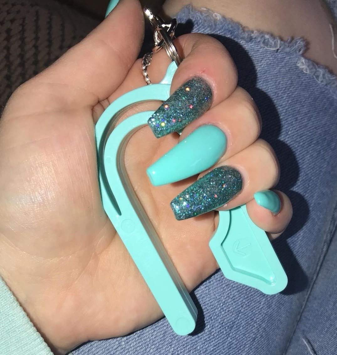 The Car Seat Key - Original Car Seat Key Chain Buckle Release Tool - Easy Unbuckle Opener Aid for Nails, Parents, Grandparents & Older Children by NAMRA Made in USA (Teal)