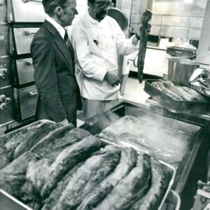 Vintage photo of Uppsala University 500 years. Dir. Folke Gyllstr246;mmer watches when chef Karl-Erik Wacander cooks 250 kg ox fillet from 80 oxs