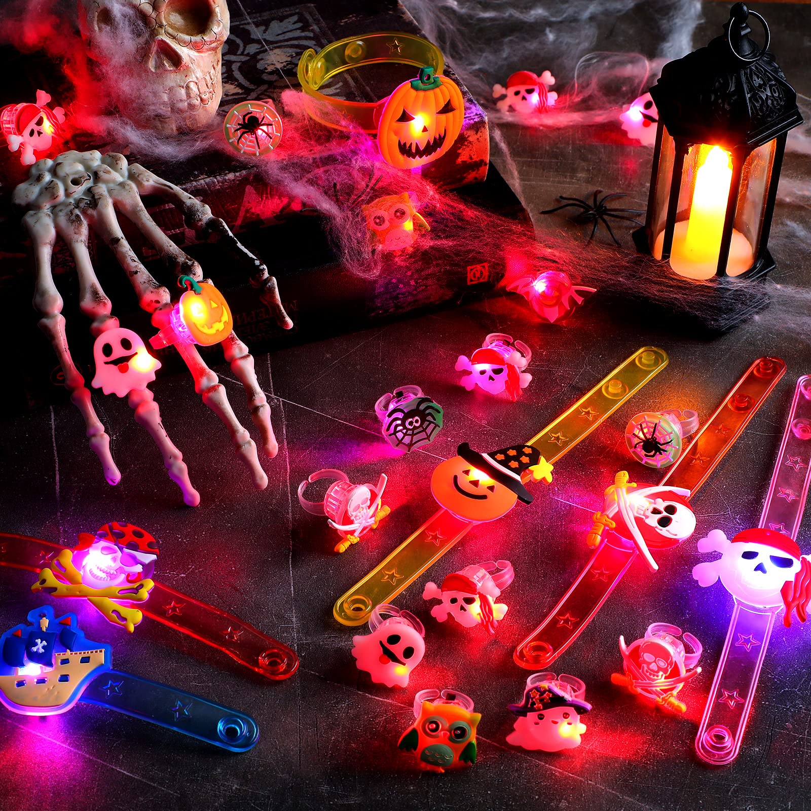 100 Pcs Halloween Party Favors Toys 76 Halloween LED Light Up Rings and 24 Bracelets Bulk for Light Up Halloween Toys Glow in The Dark for Kids Halloween Party Supplies Decorations