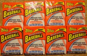 super deal! 8 original, un-opened packs of 1991 topps baseball cards. look for the atlanta braves chipper jones rookie card