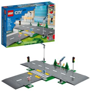 lego city road plates 60304 - building toy set, featuring traffic lights, trees, glow in the dark bricks, combine city series sets, great gift for kids, boys, and girls ages 5+