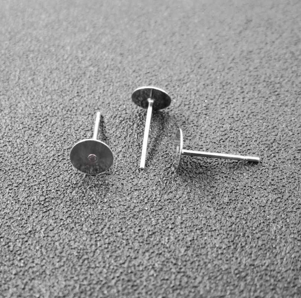 100pcs Adabele 316 Grade Surgical Stainless Steel Hypoallergenic Stud Earring Posts Findings 6mm Glue On Flat Pad with 100pcs Earnut Backs Earrings Making SEF221-6