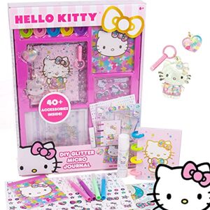 hello kitty diy glitter micro journal by horizon group usa, 40+ stationery accessories including hello kitty stickers, surprise keychain, interchangeable binder discs, squishy glitter cover & more