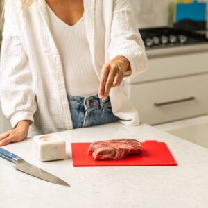 Plastic Cutting Boards for Kitchen - Colorful Flexible Cutting Mats for Cooking With Ventilated Storage Stand - Anti-Skid BPA-Free Chopping Mats for Fruits, Vegetables, Meats, Seafood & More - 4 Pack