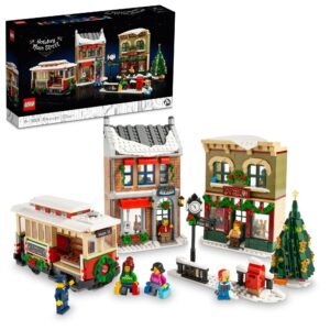 lego holiday main street building set 10308, for adults and family, christmas village building kit, holiday display set with shops, streetcar and 6 minifigures, christmas decoration to build together