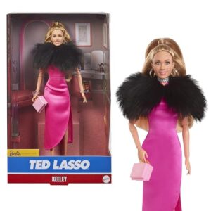 barbie signature doll, keeley from ted lasso wearing pink dress & faux fur shawl, collectible with displayable packaging