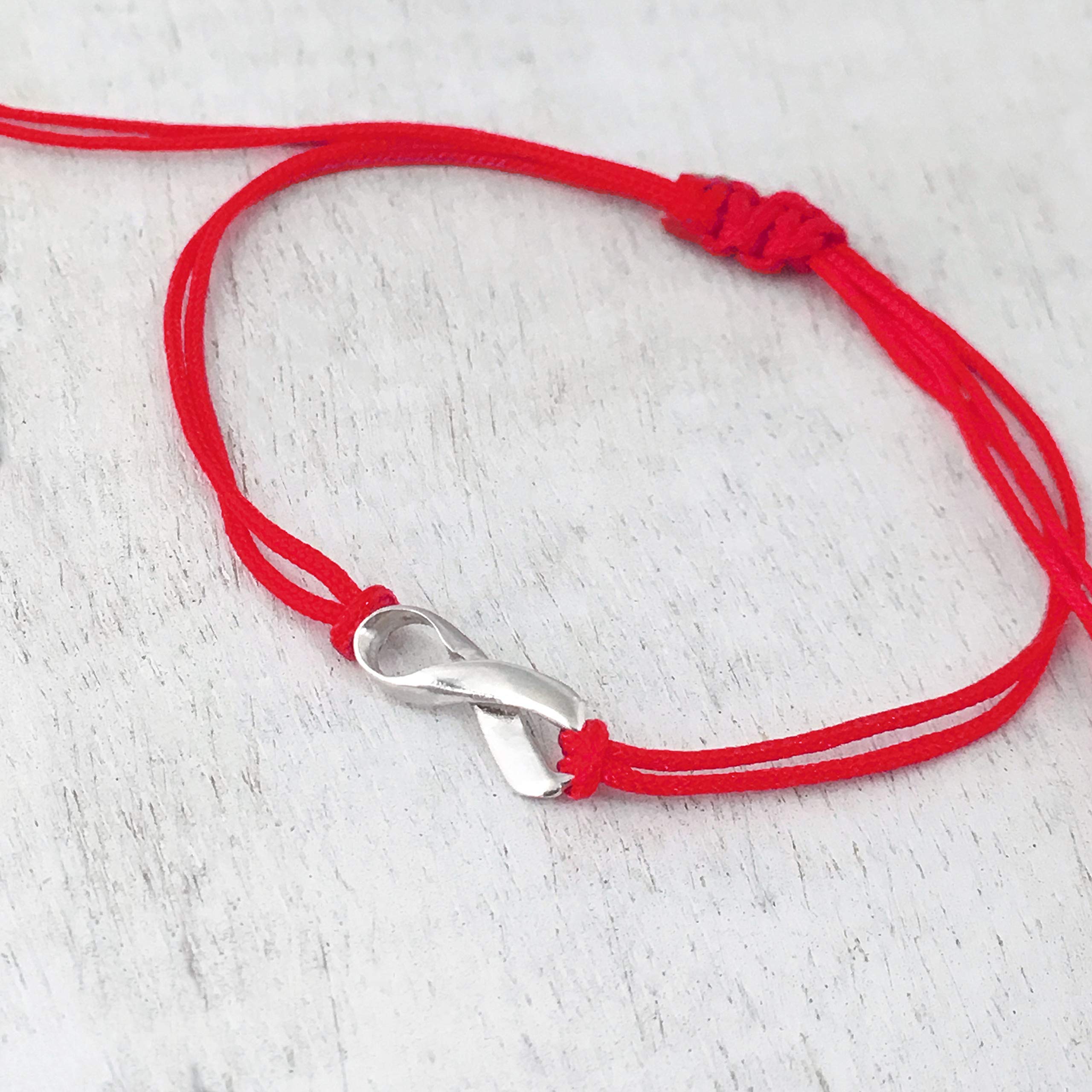 Red Thread Womens Friendship Support Bracelet, Blood Cancer Awareness Month, Small Sterling Silver Ribbon Shaped Charm. Adjustable