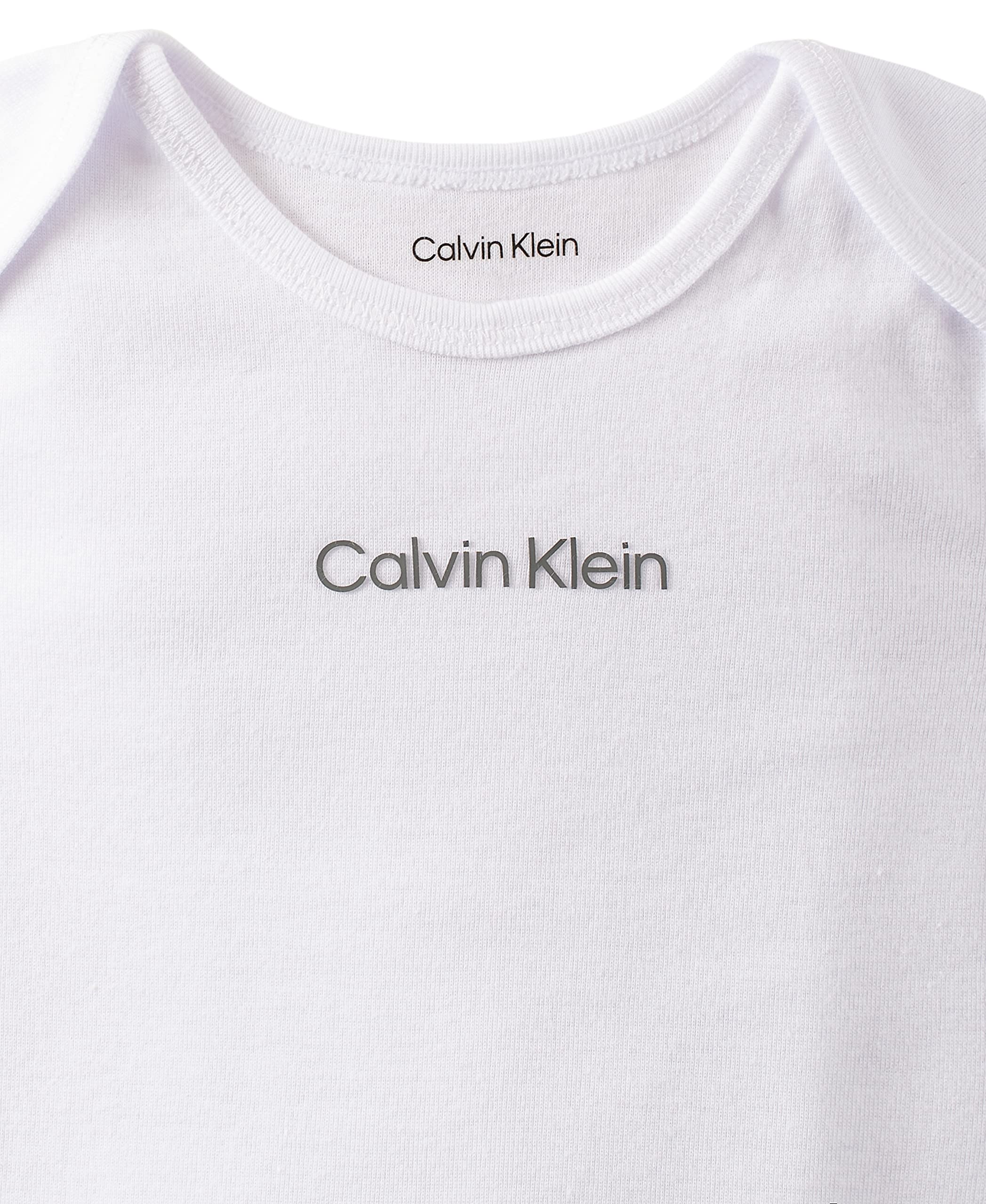 Calvin Klein Organic Unisex Baby Essentials 4-Piece Set with Long Sleeve Tee & Pants, Ultra-Soft Beanie & Socks Included, Bright White