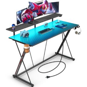 seven warrior gaming desk with led lights & power outlets, 47" computer desk with monitor shelf, home office desk with cup holder and headphone hook, ergonomic, carbon fiber surface black