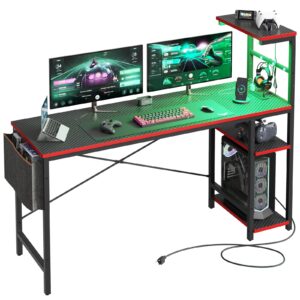 Bestier Gaming Desk with Power Outlets, 61 Inch Large Led Gamer Desk with 4 Tiers Reversible Shelves, PC Gaming Table with Headset Hook & Side Storage Bag for Bedroom (Black 3D Carbon Fiber)