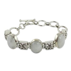 NOVICA Artisan Handmade Moonstone Link Bracelet Artisan Crafted Sterling Silver White India Good Fortune Birthstone [6 in min L x 7.75 in max L 15 mm W] ' Floral Legends'