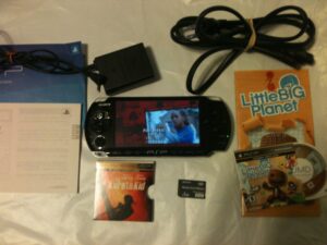 playstation portable 3000 with littlebigplanet, the karate kid [umd for psp], and 1gb memory stick pro duo - 2010 black friday bundle