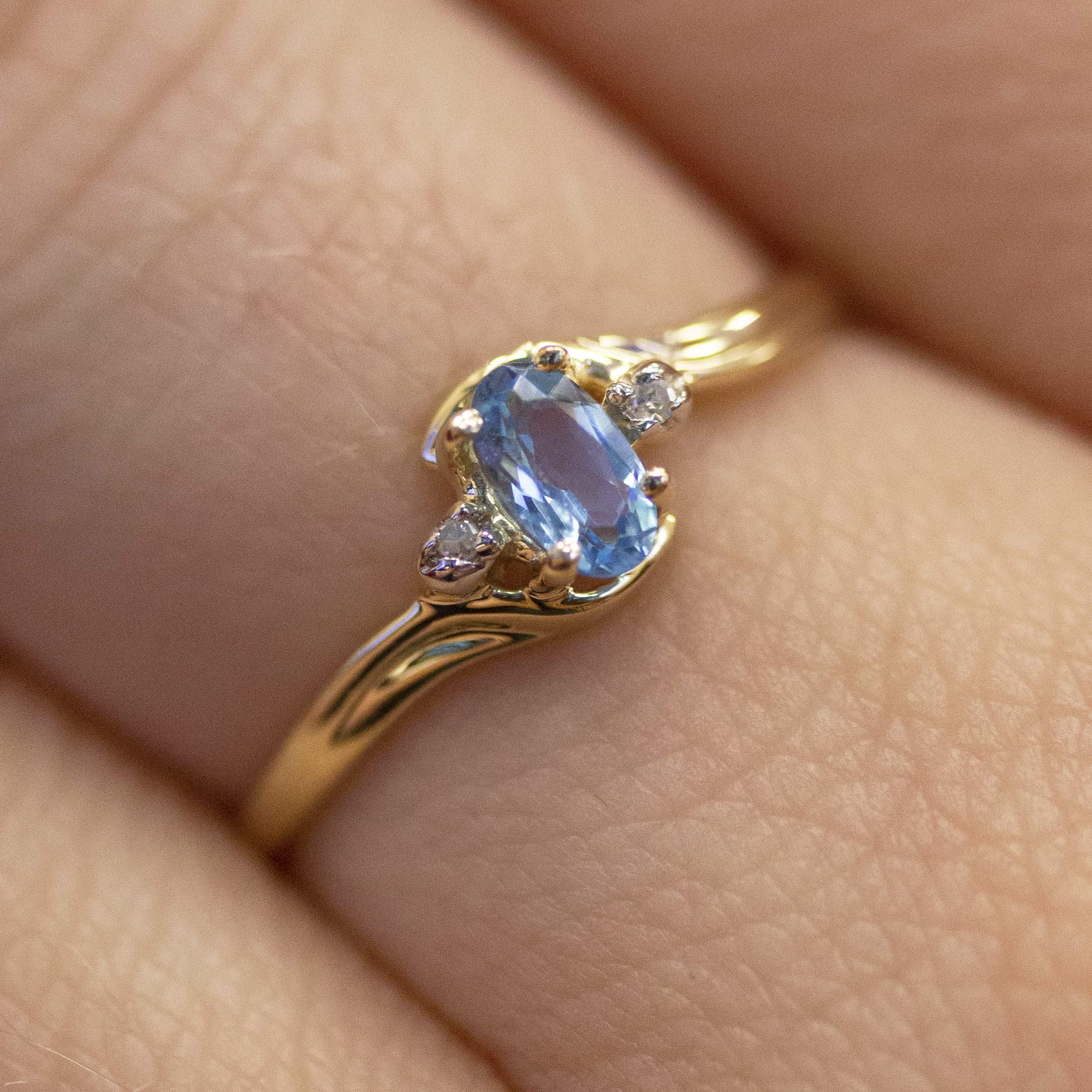 Direct-Jewelry 10k Yellow Gold Oval Blue Topaz And Diamond Ring (Size 8)