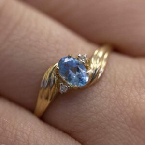 Direct-Jewelry 10k Yellow Gold Oval Blue Topaz And Diamond Ring (Size 7)