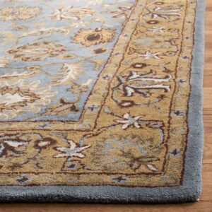 SAFAVIEH Heritage Collection Area Rug - 9'6" x 13'6", Blue & Gold, Handmade Traditional Oriental Wool, Ideal for High Traffic Areas in Living Room, Bedroom (HG958A)