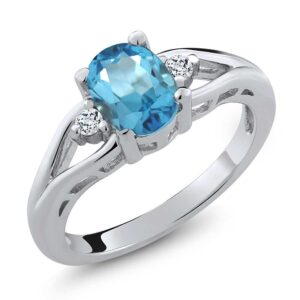 gem stone king 925 sterling silver swiss blue topaz and white topaz 3-stone ring for women (1.80 cttw, center: 8x6mm oval, gemstone birthstone, available in size 5, 6, 7, 8, 9)