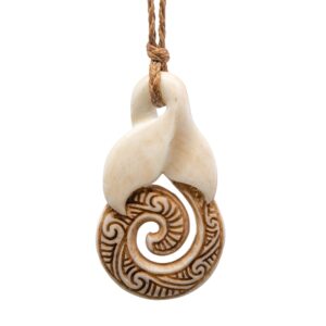 Earthbound Pacific Hand Carved Aged Bone Whale Tail Necklace with Infinity Loop and Spiral