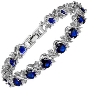 rizilia blossom round simulated blue sapphire and white cubic zirconia 18k white gold plated tennis bracelet, 7"