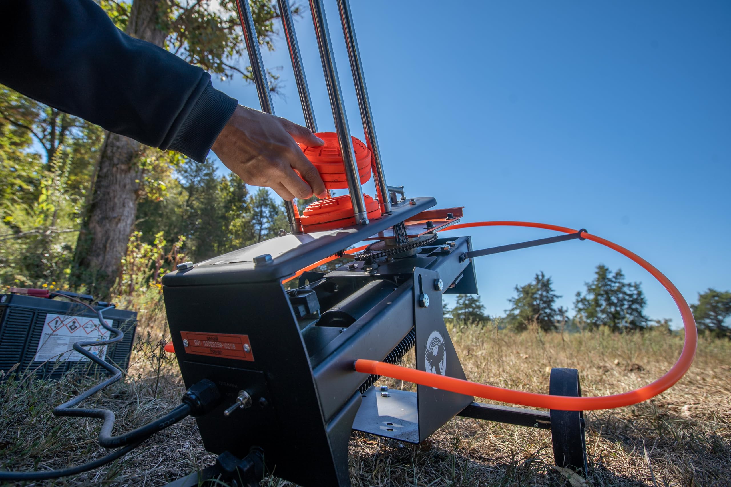 Do All Outdoors Raven Clay Pigeon Thrower with 25' Foot Pedal, Holds 75 Clays