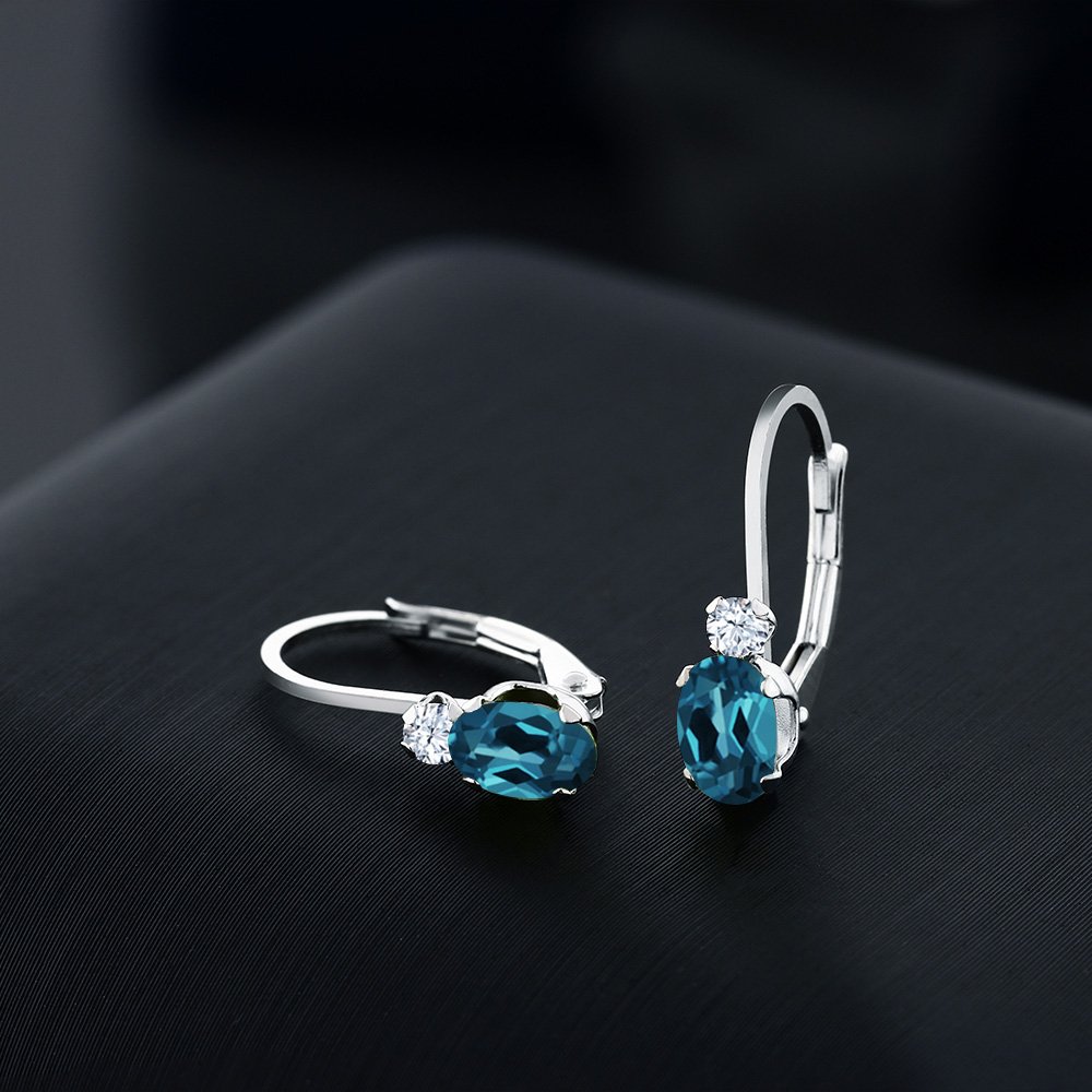 Gem Stone King 925 Sterling Silver London Blue Topaz and White Created Sapphire Leverback Earrings For Women (1.18 Cttw, Gemstone November Birthstone, Oval 6X4MM, Round 2MM, 3/4 Inch)