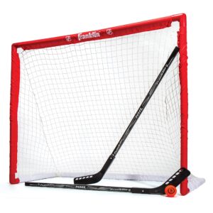 franklin sports nhl youth street hockey set - (2) kids junior hockey sticks, pvc goal + roller hockey ball included - indoor + outdoor net - 46", red