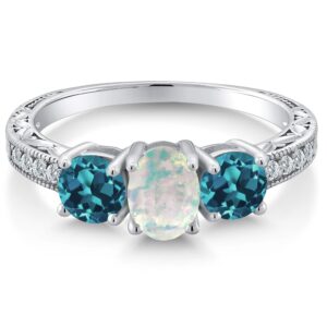 Gem Stone King 925 Sterling Silver Oval Cabochon White Simulated Opal and London Blue Topaz Ring For Women (1.75 Cttw, Gemstone Birthstone, Available In Size 5, 6, 7, 8, 9)